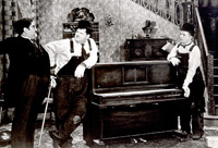 Laurel and Hardy deliver a piano